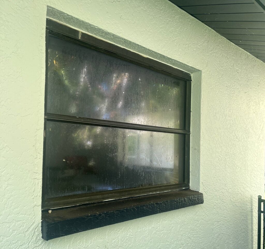 a foggy window on a wall